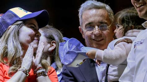 Former Colombian president Álvaro Uribe was denounced in Argentina for executions and forced ...