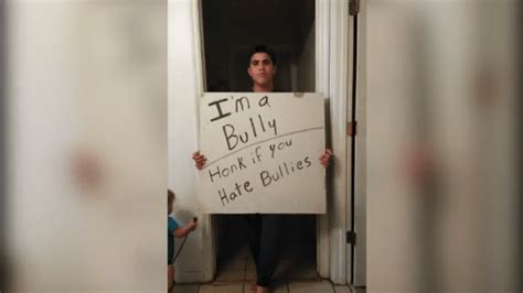 Dad forces son to hold ‘I’m a bully’ sign after learning he bullied ...