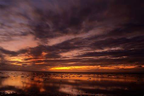 Premium Photo | Sunset at aitutaki and rarotonga lagoon, remote atolls ...