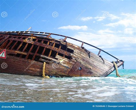 Shipwreck of a Sailing Ship after a Storm with Blue Sky. Stock Photo ...