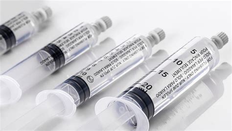 Prefilled syringes for vascular access management