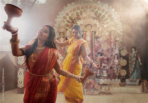 Two Married bengali women performing dhunuchi dance on the occasion of ...