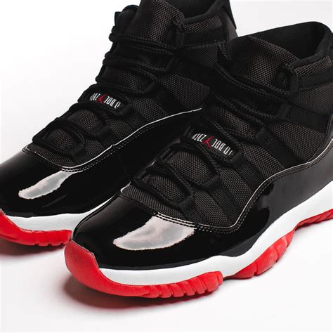 AIR JORDAN 11 RETRO "BRED" | City Blue