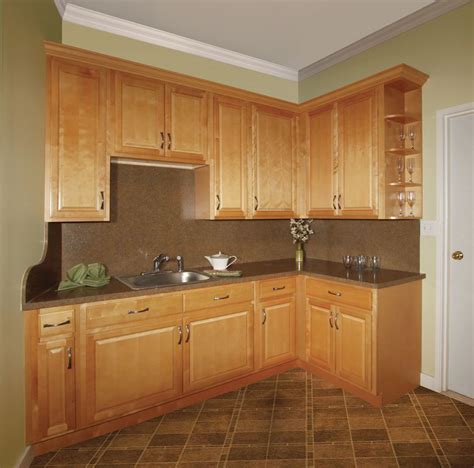 Featuring traditional overlay doors and veneer raised panels, with the ...