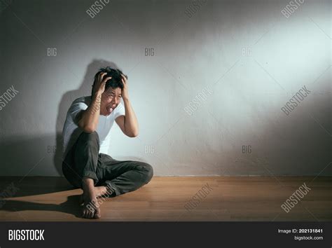 Collapsed Man Sitting Image & Photo (Free Trial) | Bigstock