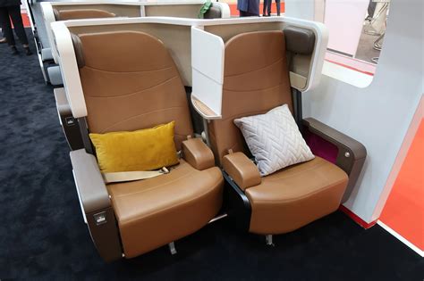 This New Design Turns Premium-Economy Seats Into a Flat Bed