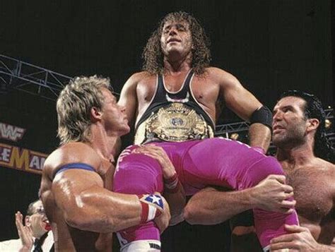 Lex Luger and Razor Ramon lift Bret Hart in celebration after winning ...