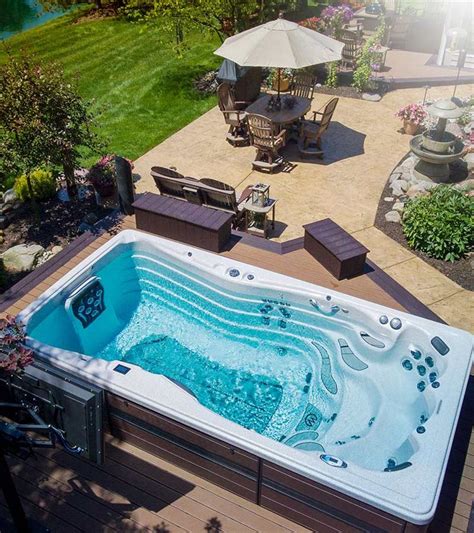 Looking to put a swim spa in your backyard? Check out these ...