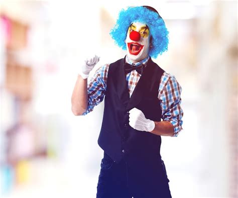 Clown screaming with blurred background Photo | Free Download