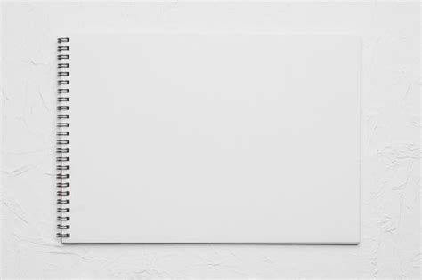 Premium Photo | White empty sketchbook on rough surface | Sketch book ...
