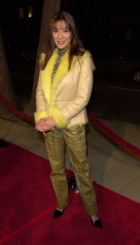 Great Outfits in Fashion History: Michelle Yeoh's Fur-Trimmed Jacket at ...