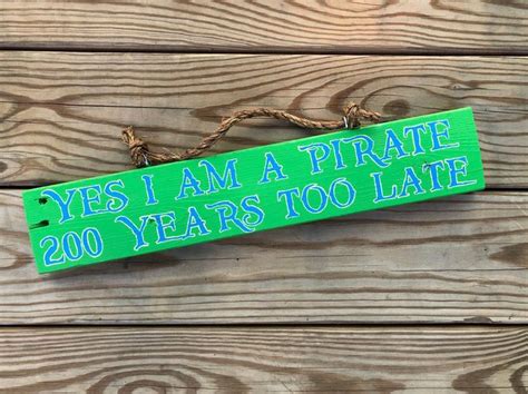 Jimmy Buffett signs lyrics a pirate looks at 40 yes i am a | Etsy | Tropical interior design ...