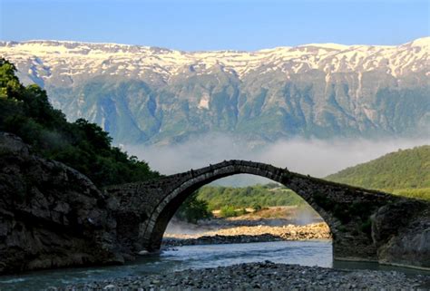 Ottoman bridge at Benje hot springs, Nemercka range in the background – Zbulo! Discover Albania