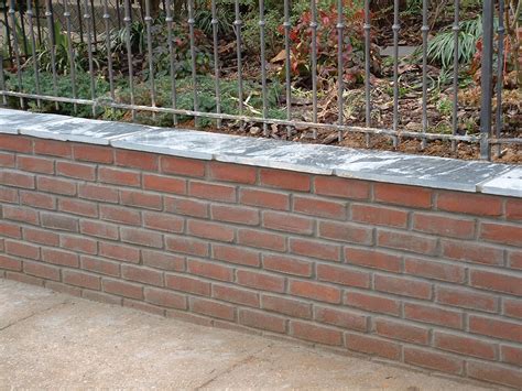 How Tuckpointing Preserves Brick Retaining Walls