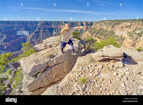 Jumping across canyon hi-res stock photography and images - Alamy