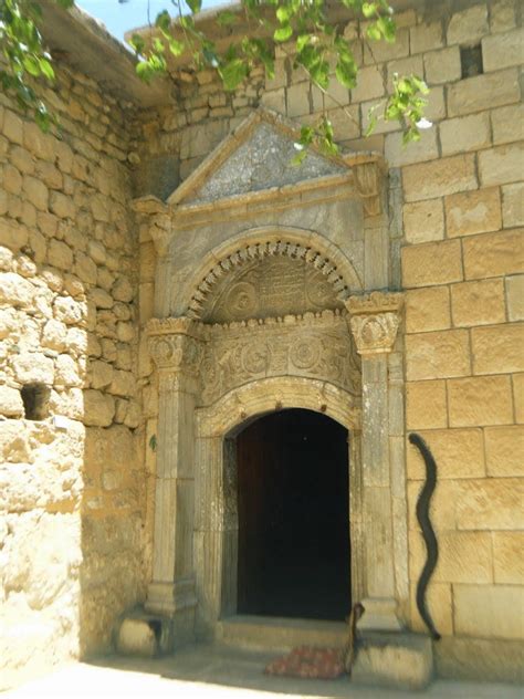 The Entrance of the Yazidi Sun Temple Lalişa Nurani. The Snake Symbol of Mithra stands for ...