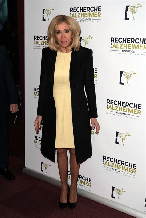 Brigitte Macron shows off timeless style in buttercup-yellow shift ...