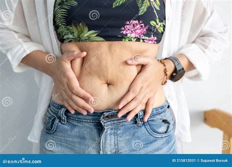 Women Body Fat Belly. Obese Woman Hand Holding Excessive Belly Fat Stock Image - Image of ...