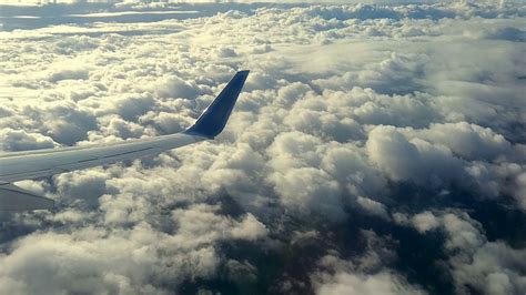 Clouds Sky Seen Through Window Of Aircraft Stock Footage SBV-333015584 - Storyblocks