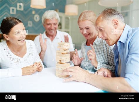 Playing Board Game with Friends Stock Photo - Alamy