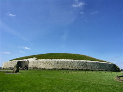 The burial mound of Newgrange in County Meath, Ireland is one of the ...