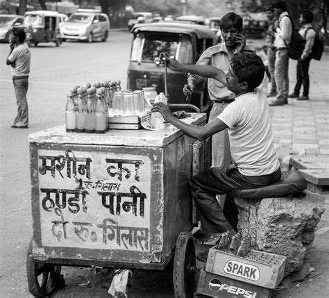 A street hawker selling cold drinks from his refrigerated … | Flickr
