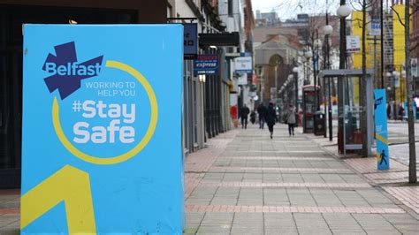 Coronavirus - Tue Jan 12, 2021A public information sign on an empty street in Belfast as ...