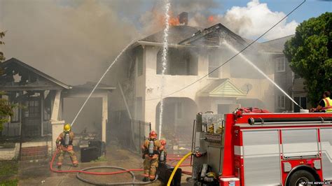 Writer rushes into burning building to save two finished novels - BBC News