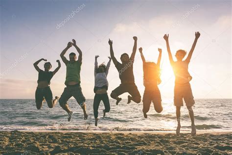 People Jumping at Beach — Stock Photo © william87 #44583947