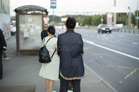 People are Waiting for Bus. Waiting for Transport at Bus Stop Editorial ...