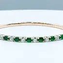 Emerald & Diamond Yellow Gold Bangle Bracelet for sale at auction from 18th August to 17th ...