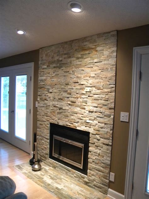 Love this stone veneer fireplace! | Stone veneer fireplace, Fireplace design, Stacked stone ...