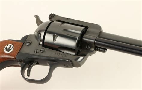 Ruger Blackhawk SA Revolver, .357 cal., 6 ½” barrel, wood grips, blue finish, S/N 111703. This rev