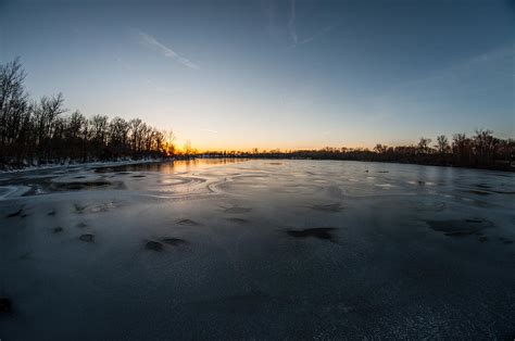 Winter Sunset on the Frozen Lake Photograph by Ryan Bush - Fine Art America