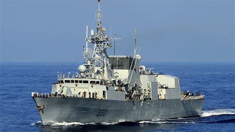 The Canadian patrol frigate HMCS Halifax (FFH 330) transits the ...