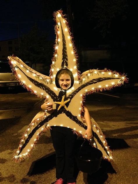 Our homemade starfish halloween costume. | Little mermaid costume, Mermaid costume, Under the sea