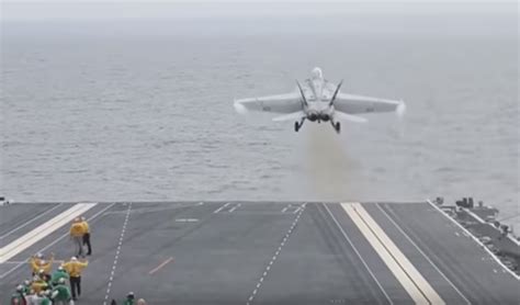 Watch the Navy's newest, most sophisticated aircraft carrier land and launch its first aircraft ...