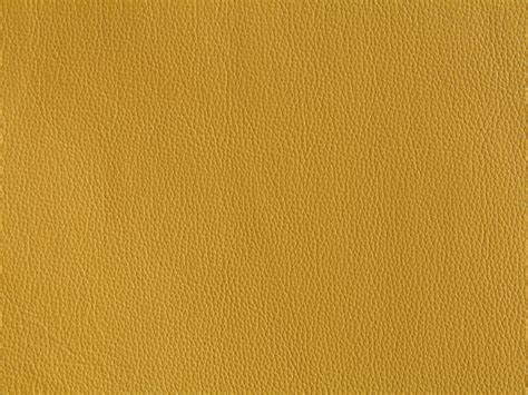 yellow-leather-texture-wallpaper-fabric-material-design-bright-stock-photo - Texture X