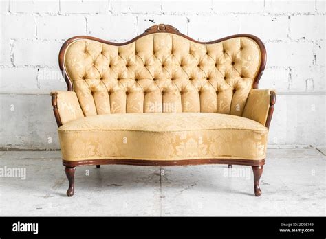 Brown Retro classical style sofa couch in vintage room Stock Photo - Alamy