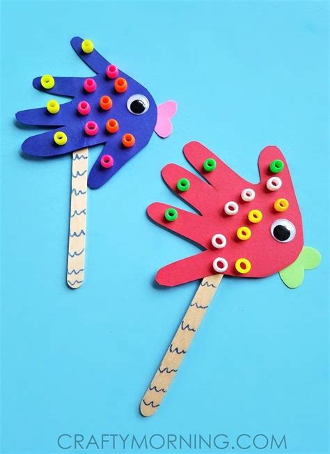 Handprint Fish Puppets | Ocean crafts preschool, Fish crafts preschool ...