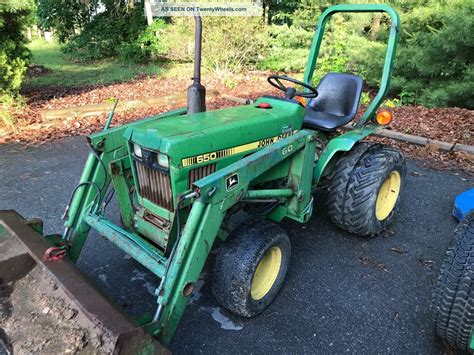 John Deere 650 W/ Loader