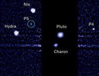 Discovery of fifth moon reignites Pluto planet debate | New Scientist