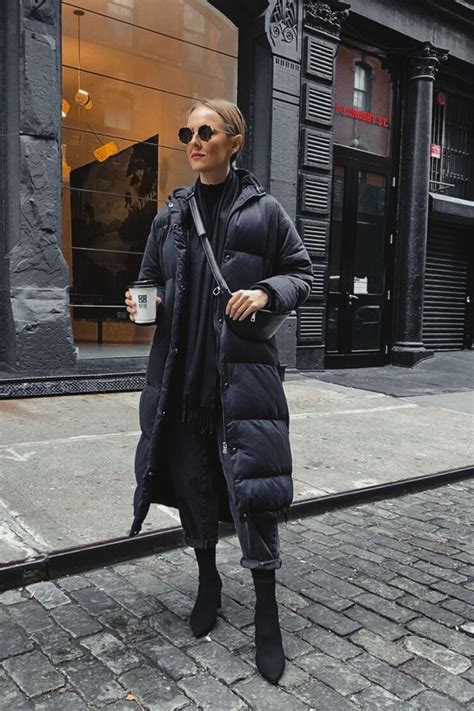 All Black Winter Outfit: Full-Length Puffer Coat With Slouchy Jeans and Sock Boots || Danielle ...