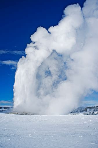 Old Faithful In Winter Stock Photo - Download Image Now - Blue ...