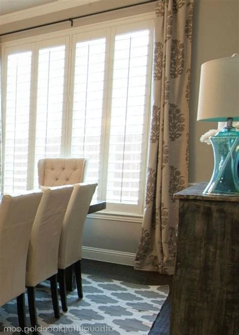 Photos of plantation shutters with curtains