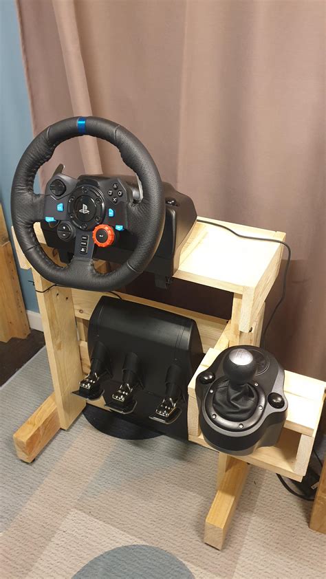 DIY wheel stand made out of wood. Pedals fold up and it's great! Was a better alternative to ...