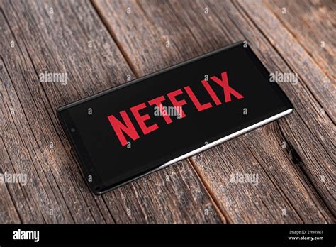 Netflix company logo on the smartphone screen Stock Photo - Alamy