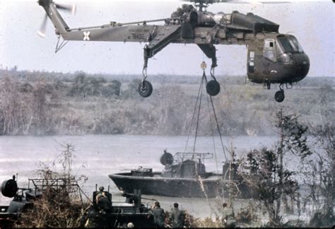 Vietnam War. A US Army Sikorsky CH-54 Tarhe heavy-lift cargo helicopter ...