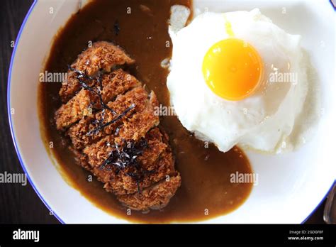 Curry rice with fried pork Stock Photo - Alamy