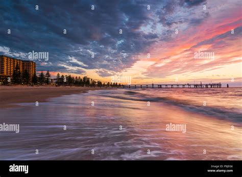 Sunset at the always-popular Glenelg beach and jetty, near Adelaide, South Australia Stock Photo ...